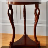 F13. Round swan leg side table. 22”h x 16”d 